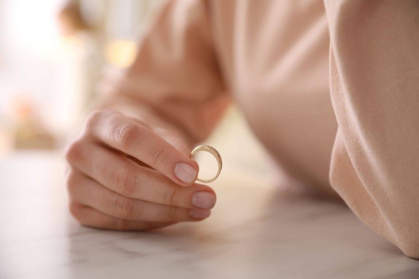 Women holding wedding ring